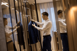 Man selecting a suit Sudsies