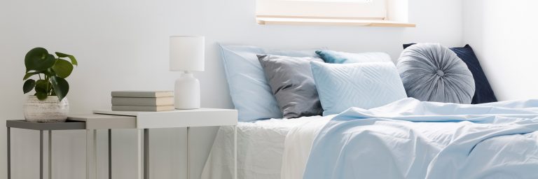 white and blue bedsheets