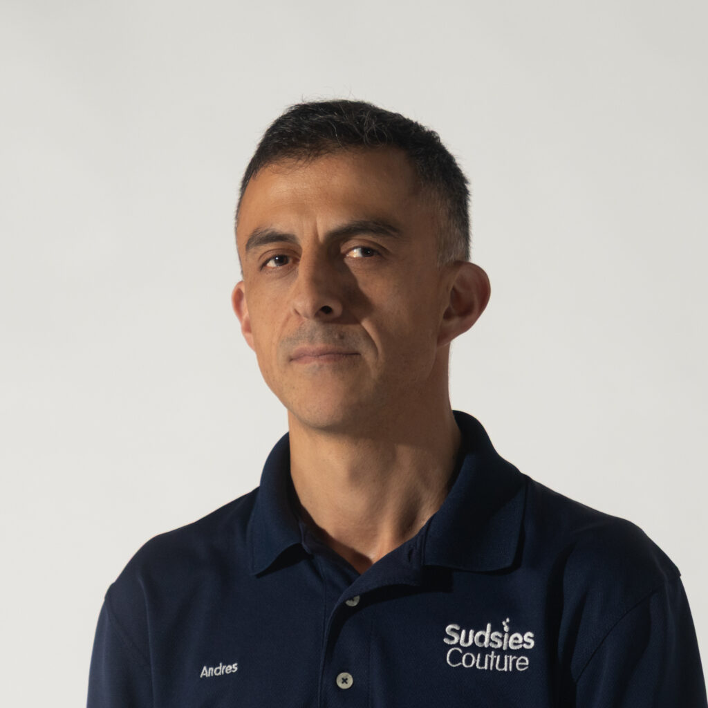 Andres, a Sudsies valet providing expert garment care with a personal touch