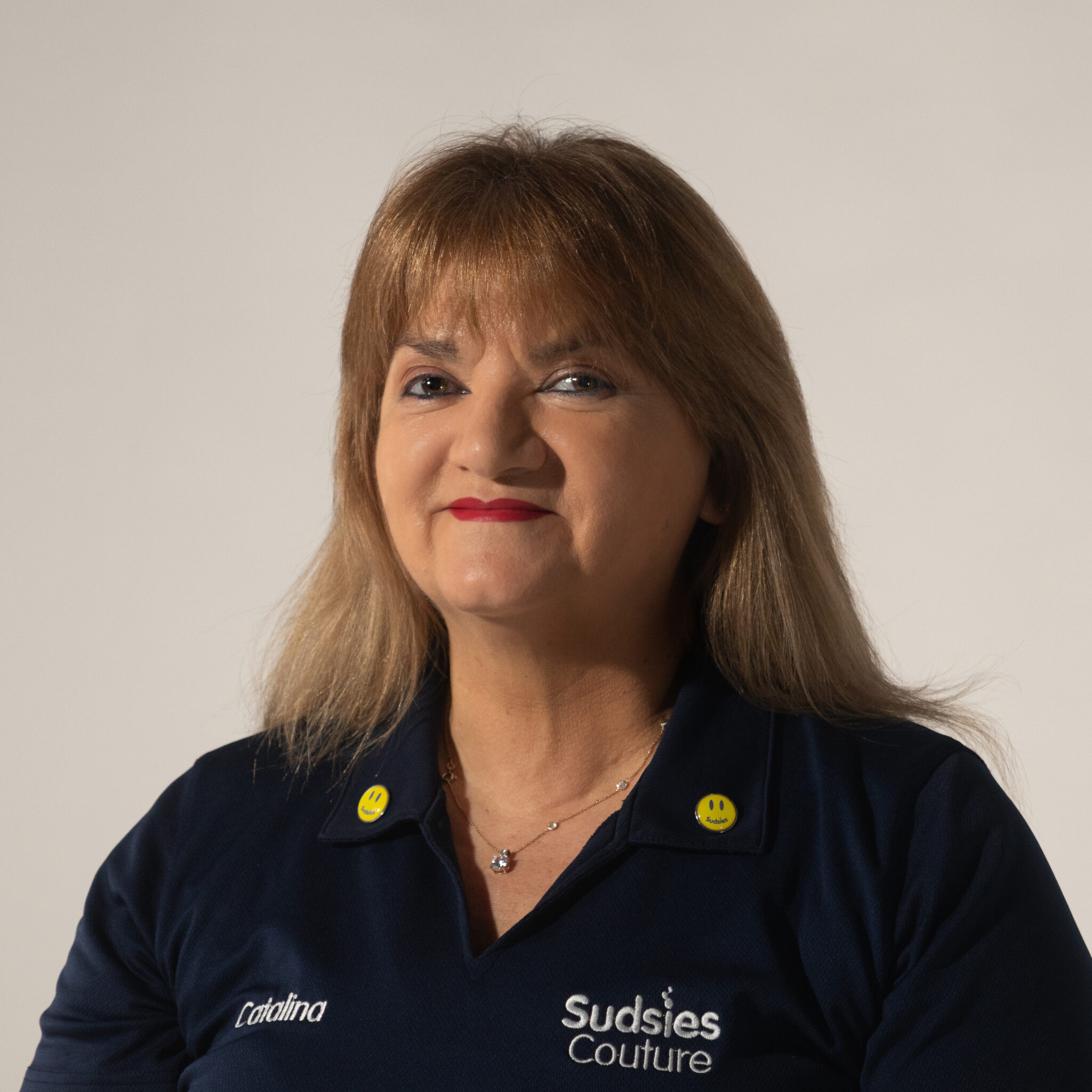 Portrait of Catalina Ayala, Guest Services Specialist at Sudsies’ Miami Beach boutique.