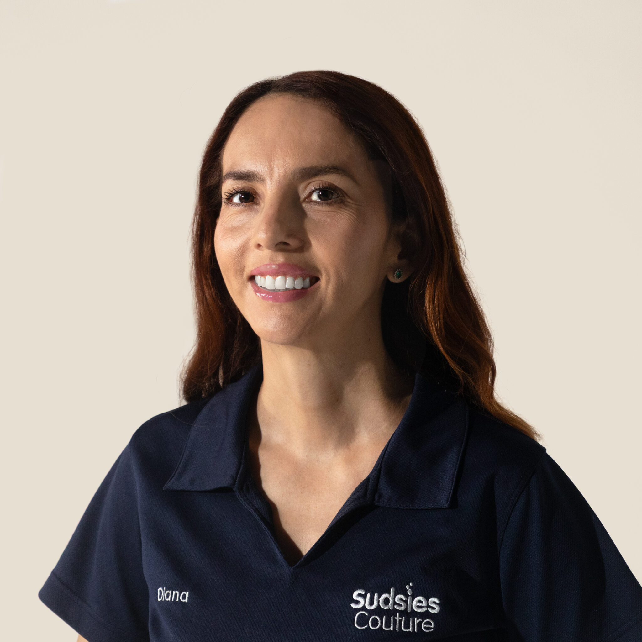 Portrait of Diana Alexandra Sierra, Guest Services Leader at Sudsies’ Miami Design District boutique.