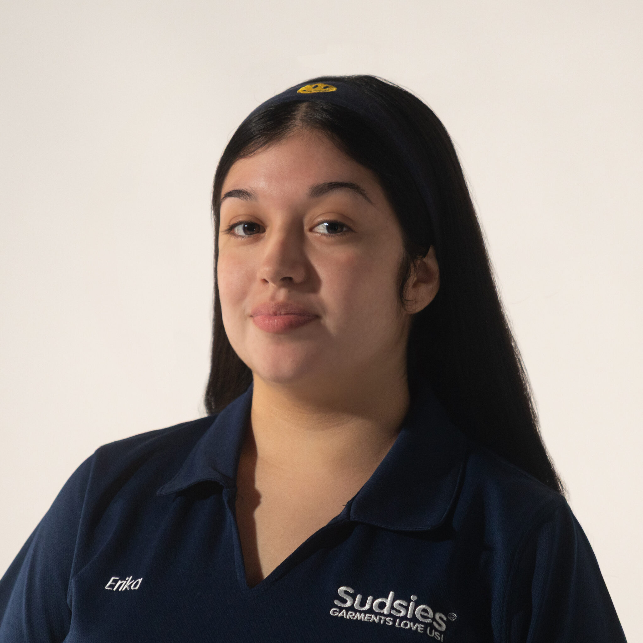 Portrait of Erika, a guest services specialist at Sudsies