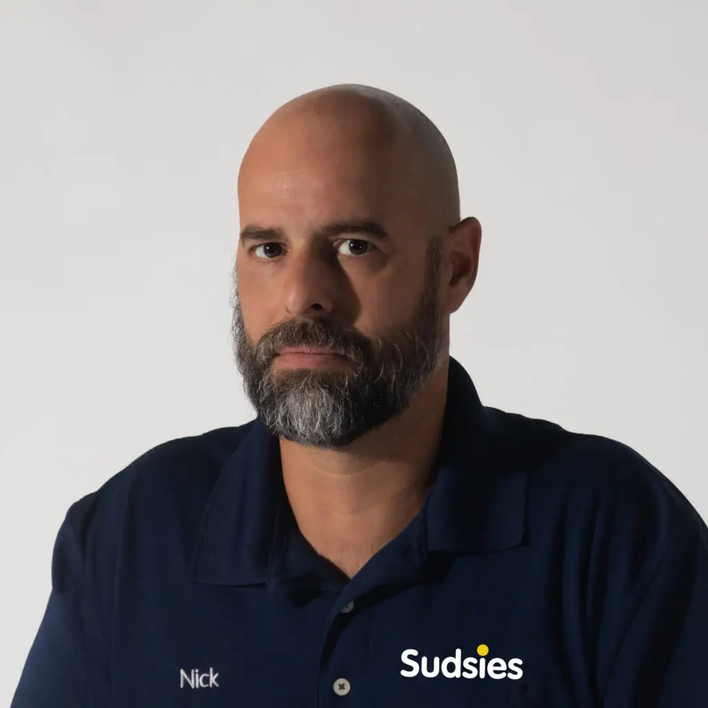 Sudsies valet Nick providing premium garment pickup across Biscayne, Aventura, and Sunny Isles