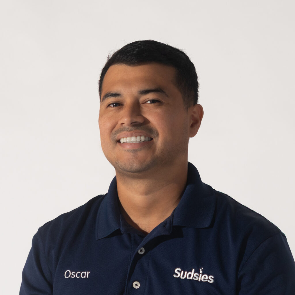 Oscar, a Sudsies valet delivering expert garment care in Key Biscayne and Brickell