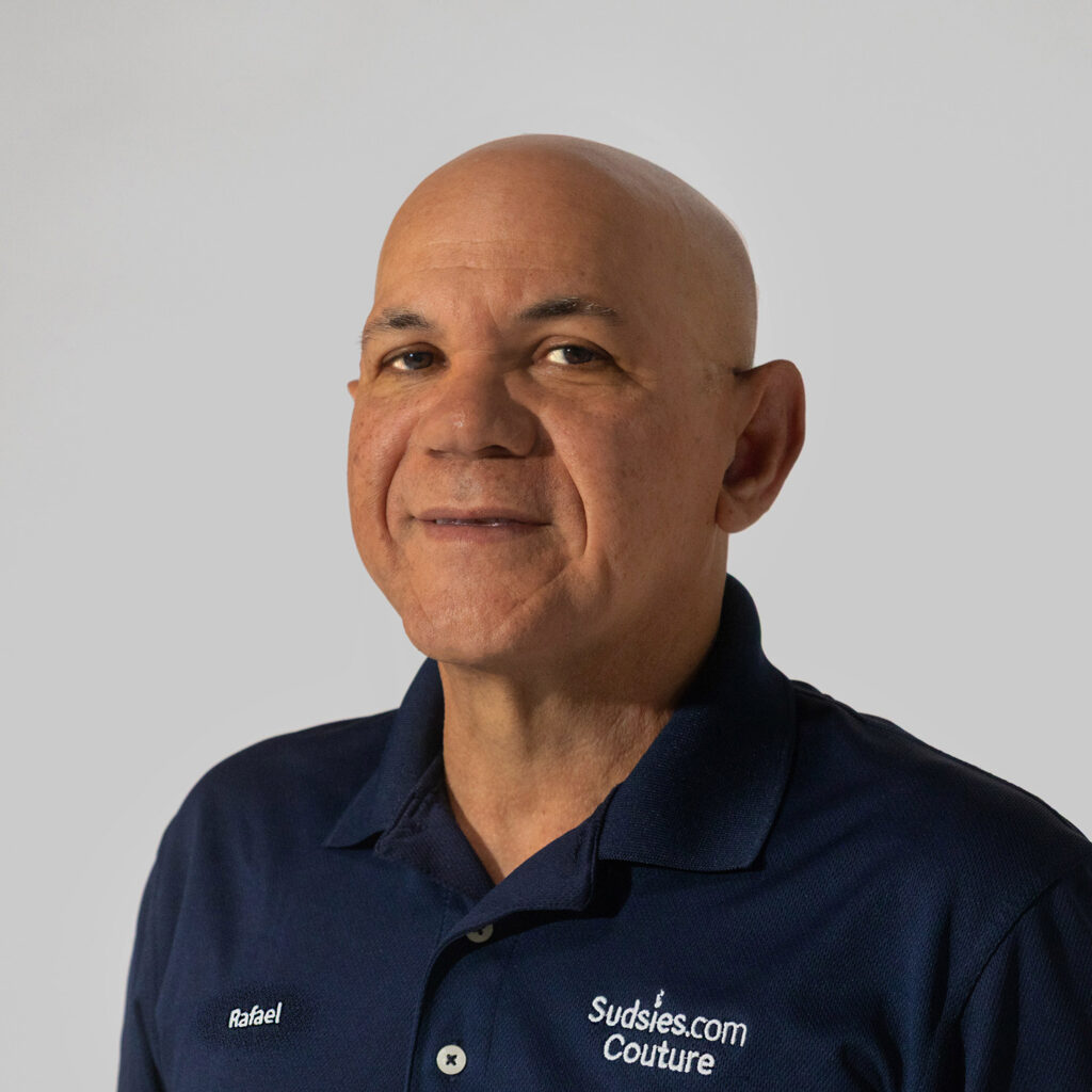 Rafael Santos, tailor at Sudsies, in navy Sudsies polo