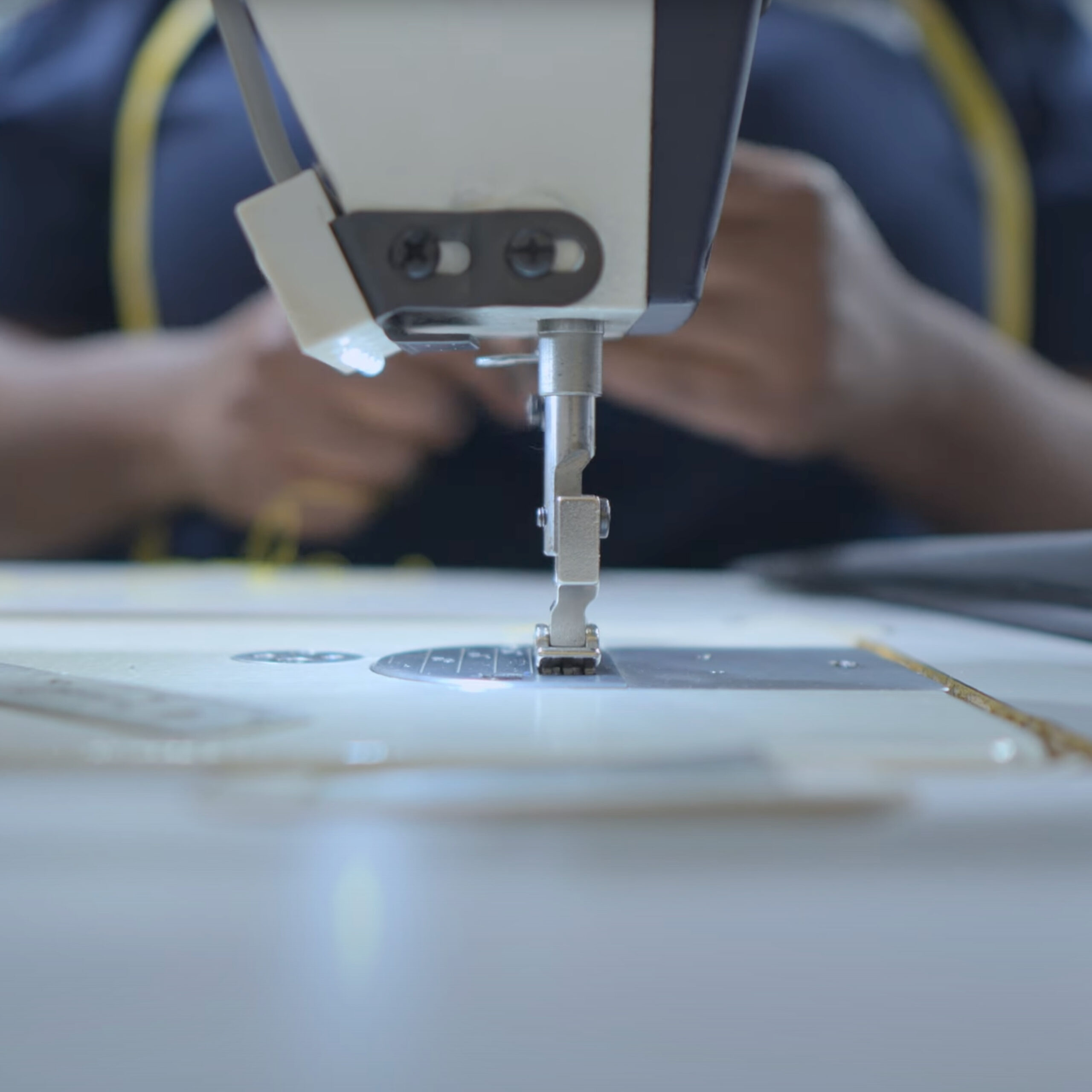 Close-up of a sewing machine used for expert alterations at Sudsies.