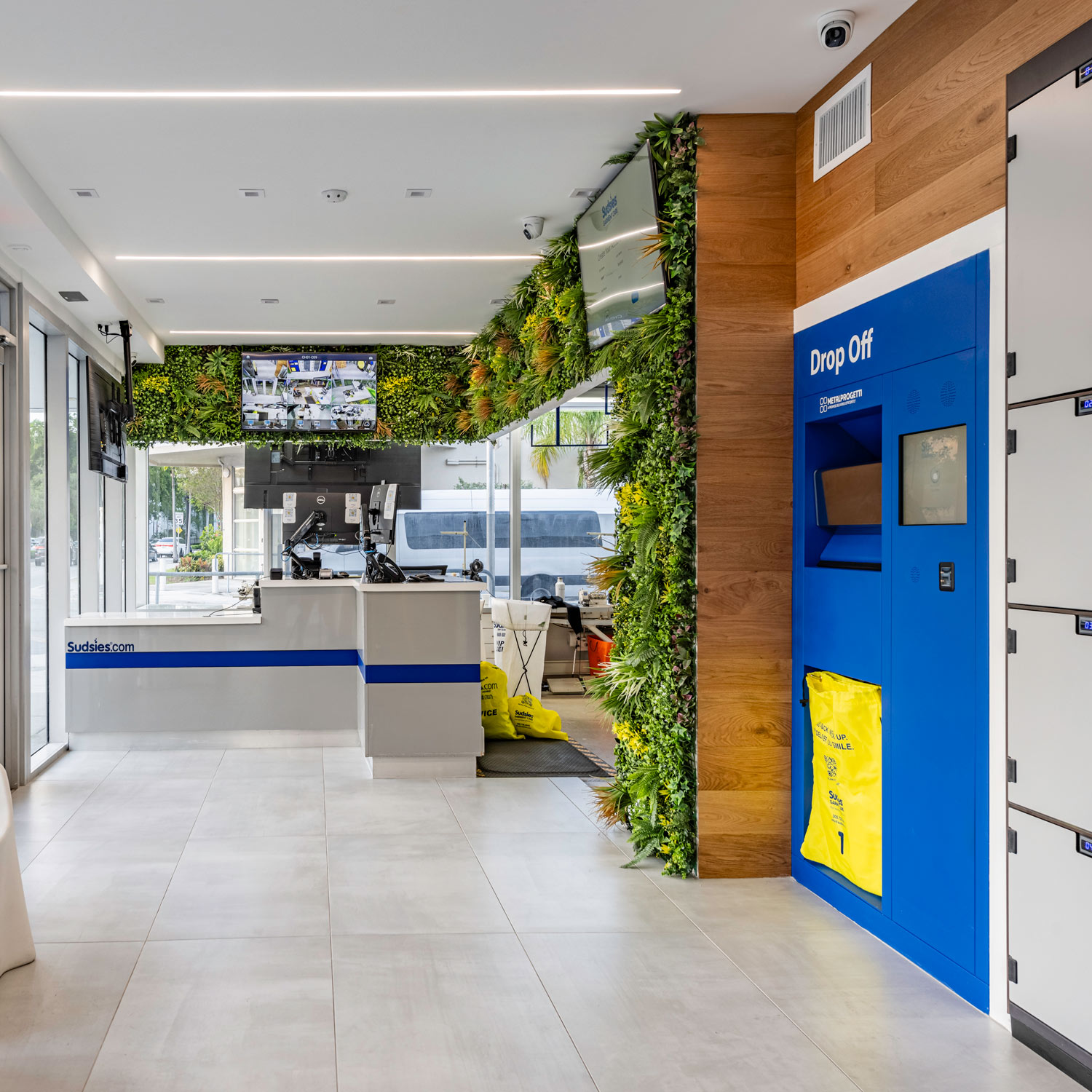 Design District Dry Cleaning Boutique Sudsies Design District CSR Station Interior with Concierge Counter and Lockers