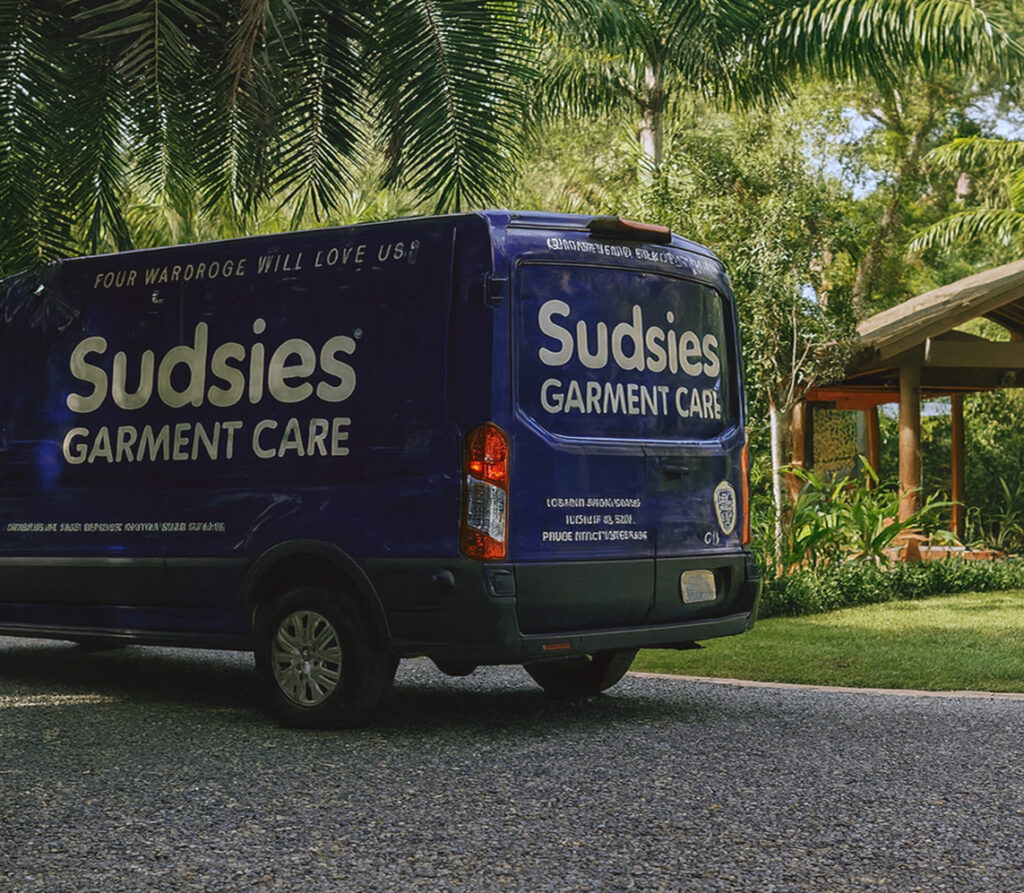 Sudsies Garment Care pickup and delivery van providing convenient dry cleaning service to homes and condos across Miami and Fort Lauderdale.