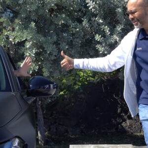 Sudsies customer service representative assisting a guest at boutique pickup