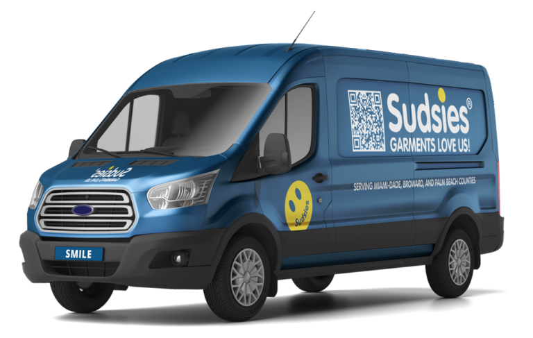 Branded blue Sudsies delivery van with QR code and logo, advertising garment cleaning service for Miami-Dade, Broward, and Palm Beach counties.